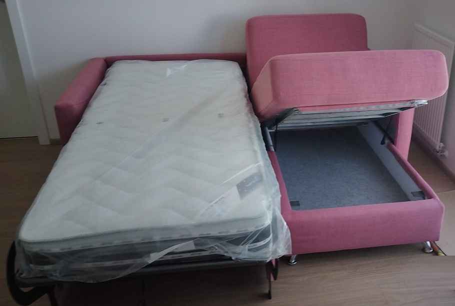 AMBROGIO - kompaktní rohová sedací souprava s rozkládací postelí Vitarelax